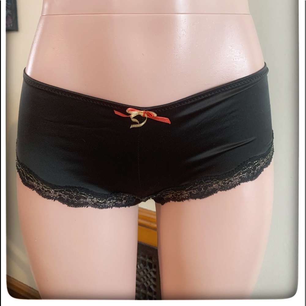 Black Venus silky panties size medium.